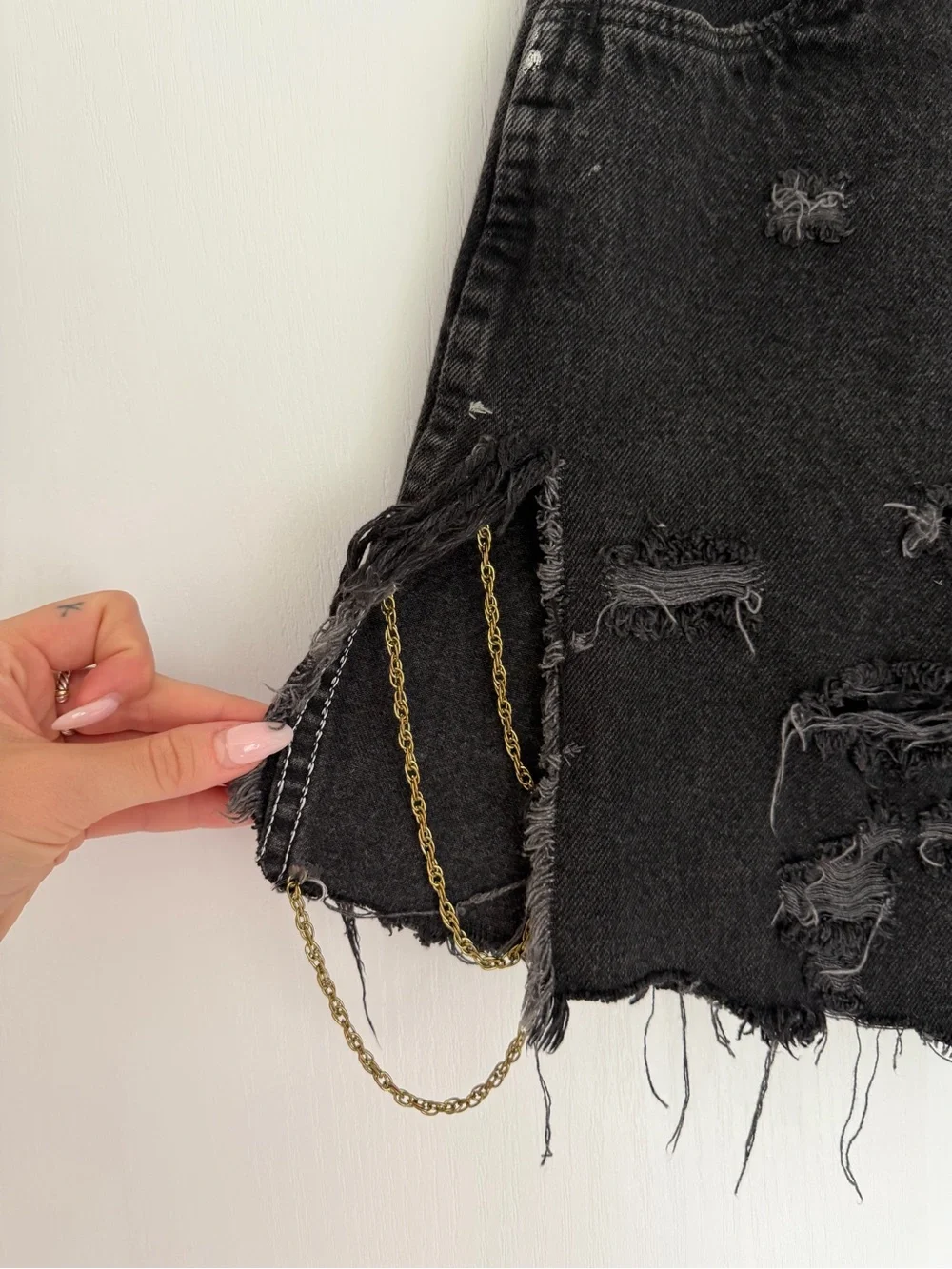 Distressed Black Denim Cutoff Shorts